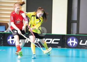 Team captain Hannah Wilson (left) competes for Canada